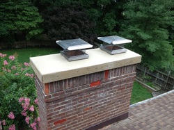 Concrete chimney crown with ran caps